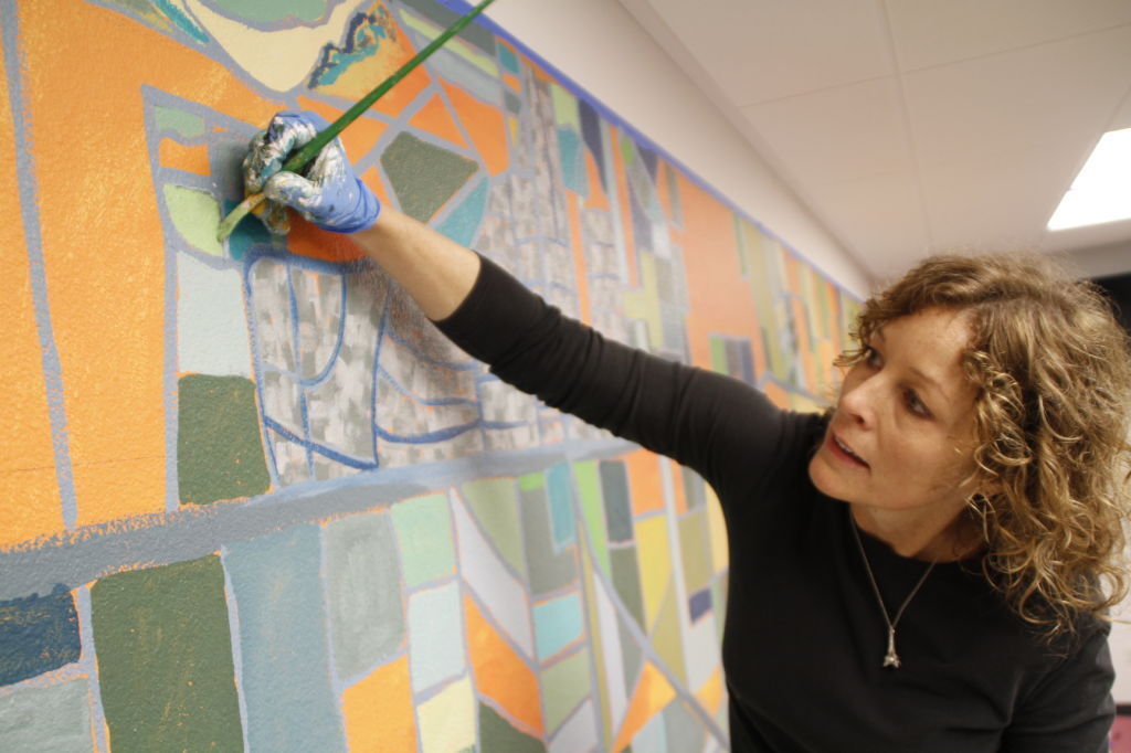 Mural brings color, imagery to SM high school district board room
